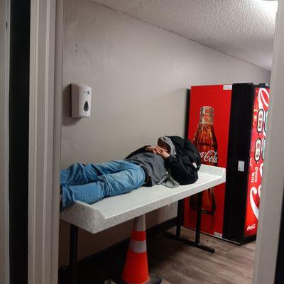 Homeless sleep in laundry room