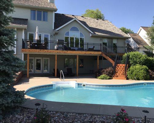 Cedar deck refinish with Westbury aluminum handrails. Urbandale, IA