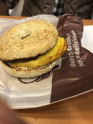 Bagel with egg and sausage