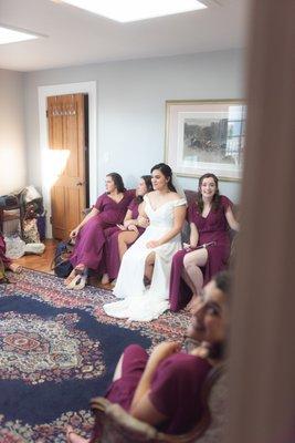 Bridesmaids hanging out in bridal suite before the ceremony.