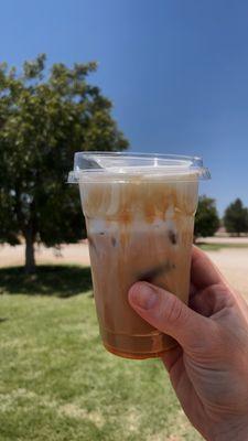 Small iced caramel macchiato, half sweet, with vanilla cold foam.