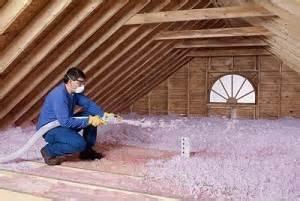 Blowing fiberglas insulation into an attic space