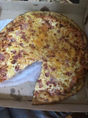 Ham, pineapple and cheese pizza