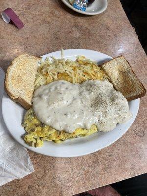 Omelet with sausage gravy on top