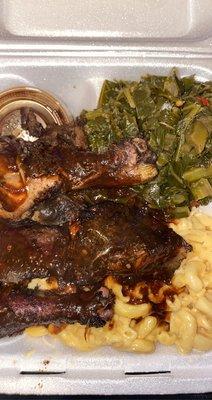 Jerk Chicken with Side Of Collard Greens and macaroni & Cheese .