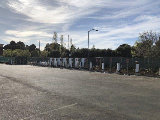 Coming soon Tesla Urban super chargers next to 5 Guys and Kennedy park.