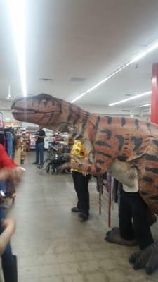 Even a T-Rex knows Red Racks has the best deals. But don't try to take the Hawaiian shirts he likes.