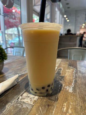 Mango milk tea with tapioca pearls (25% sugar). Delicious!