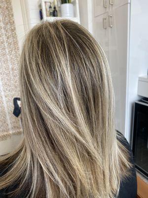 Dimensional buttery blonde highlights