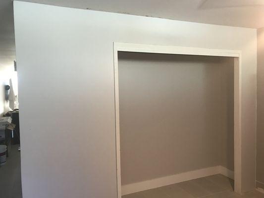 2b. Paneling and side shelves removed from closet and completed drywall & paint.