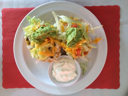 Puffy Tacos (Guac & Sour Cream) crafted with Fresh hand-made Corn Tortillas.