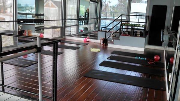 Upstairs barre area.  Mirror in back makes it seem bigger than it is.  Cozy size = smaller classes!