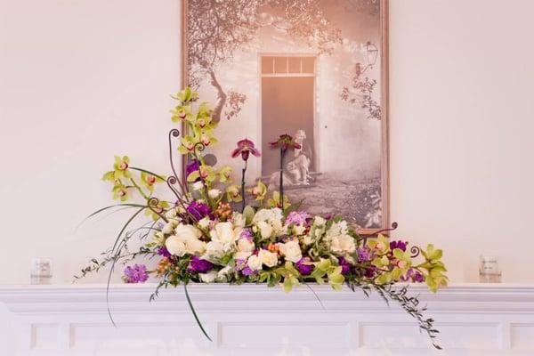 Mantelpiece floral decor from W/E Flowers.
 Photo credit: Studio Dizon