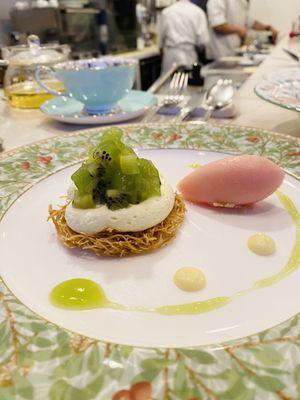 White Chocolate Mousse with Kiwi marinated in Lavender on crispy Kataifi and Grapefruit Sorbet