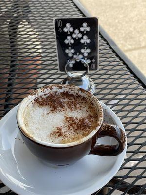 Cappuccino- has oat milk.  The coffee is bitter/acidic but smooth.  Not for me but still good.