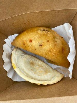 Cheesesteak empanada and white corn empanada