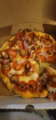 Peperoni, sausage, onion pizza