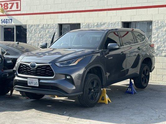 Stock rims painted black on 2021 Toyota Highlander Hybrid