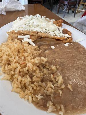 Moist, flavorful,  pork tamale with some rice & beans. Bueno!!