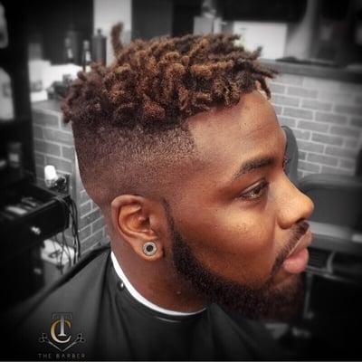 High top fade w/ dread lock twist on top