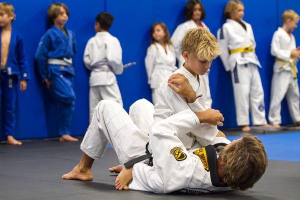 Our kids program includes Jiu Jitsu and Judo.