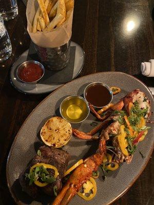 6 oz filet steak and 1/2 lobster with "crab" fries (old bay seasoned fries) (FMOI @FeedTheStrEATs)