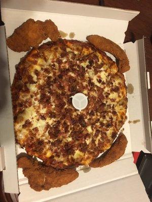 Sausage, Onion and bacon pizza. Love all the bacon. Plus the chicken strips are flame.