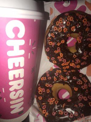 Large Hot Chocolate and two Chocolate Frosted Holiday Donuts.