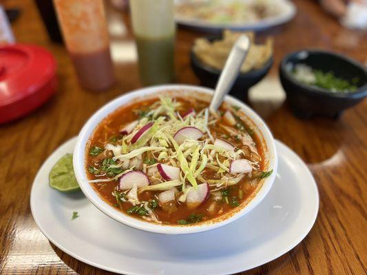 Pozole Rojo with pork. Perfection! Not spicy at all until you add the red sauce from the bottle, but full of flavor!