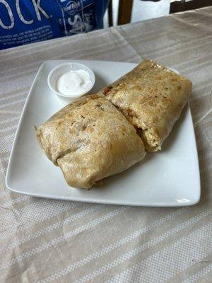 Chicken burrito (sour cream normally comes inside, we asked for it on the side).