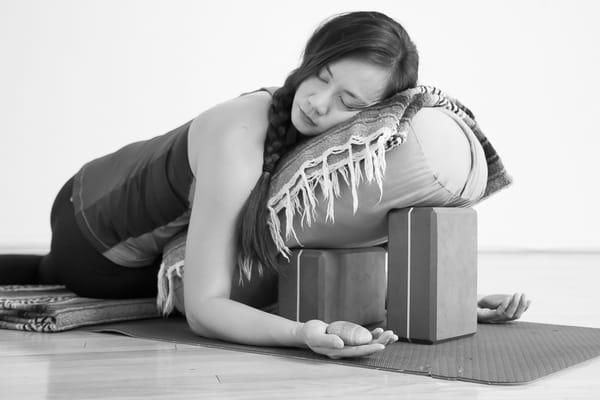 Restorative Yoga with Hot Stones taught by Marion