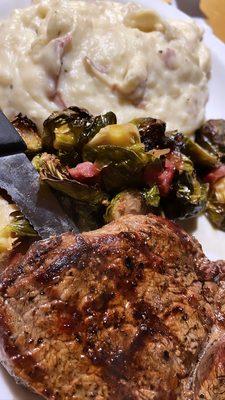 10 oz ribeye, garlic mashed potatoes and Brussel sprouts