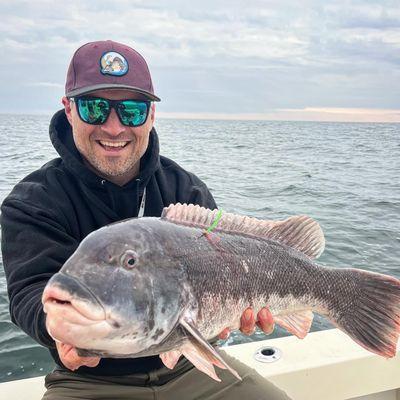 Cold weather means it's time to go tog fishing! Here's Greg with a 10# tog from 1/1/24. Gear up for tog fishing today at Fish Heads!