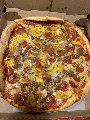 Sausage, pepperoni, mushrooms, peppers