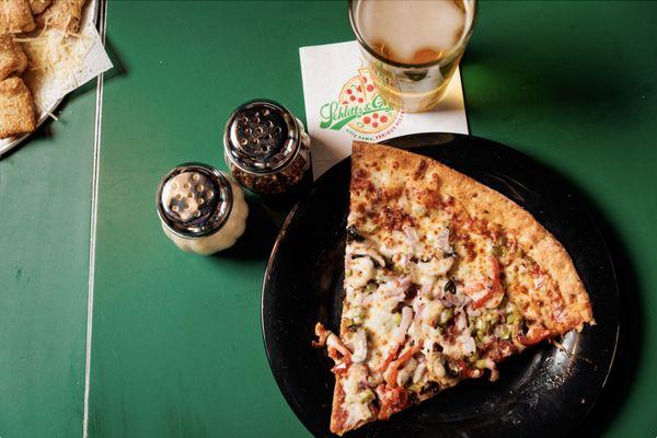 Kitchen Floor slice and a draft beer