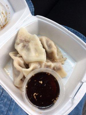 Steamed dumplings with ginger soy sauce