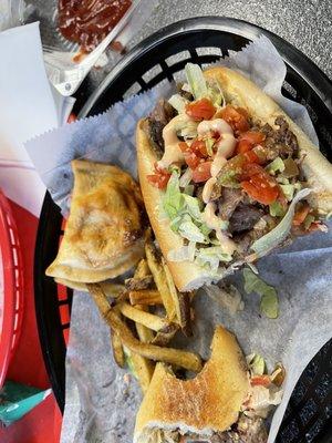 Cali cheesesteak some fries and a 'rogi