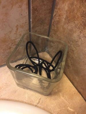 Extra hair ties in the bathroom -- such a thoughtful touch!