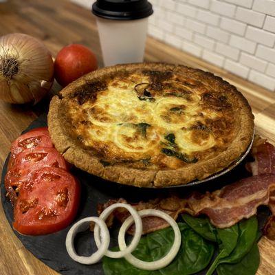 Crumb. Quiche! 
Bacon, Gruyere, tomato, onion and spinach.