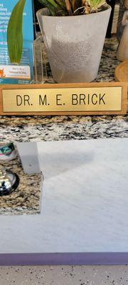 DR. M. E. BRICK