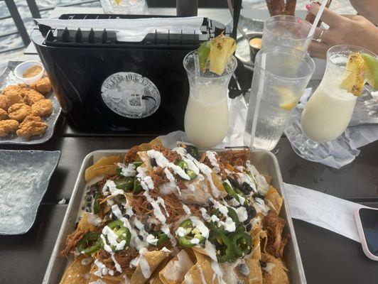 nachos & piña colada, delicious but not served on saturdays. because no food is served on Saturdays apparently.