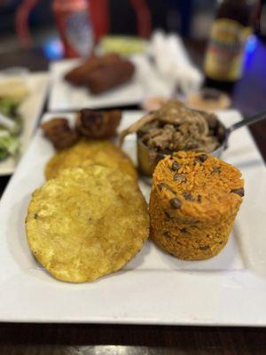 Arroz Con Gandules Pernil with Tostones