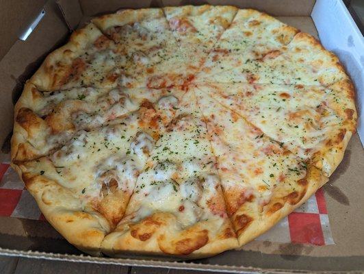 Large cheese n sausage.... Love it... Always order pizza to go when passing by... Best pizza in the area...