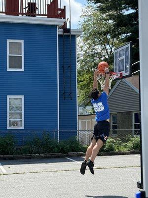 Me Dunking for one of the things we volunteered for coaching/playing with kids