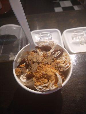 Reese's peanut butter cup  hot fudge and marshmallow creme topped with hot fudge and butterfingers