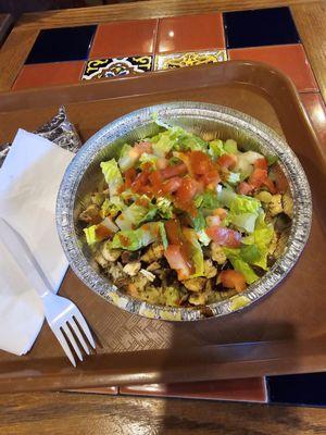 Burrito bowl with rice, beans, chicken, medium salsa, and lettuce