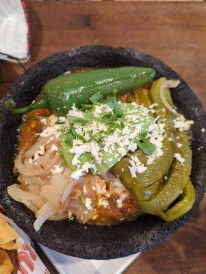 Molcajete.. chicken,carne asada, cactus.. delicious