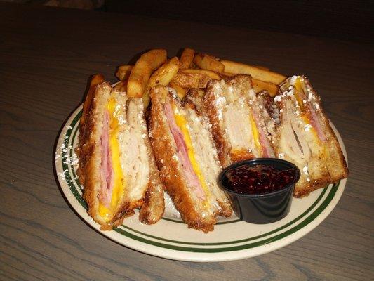 World Famous Monte Cristo with golden thick cut fries.