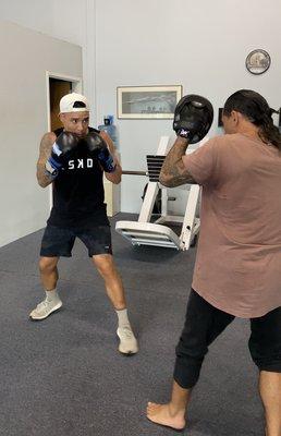 Boxing pad work training