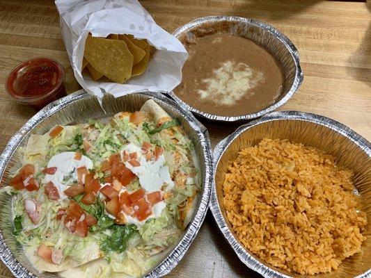 House Special "Enchiladas De La Casa" made with flour tortillas instead of corn tortillas. I also purchased sides of Rice and Refried beans.